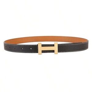 6.99$ shipping!! Size 110-Black and Tan reversible Designer inspired Belt